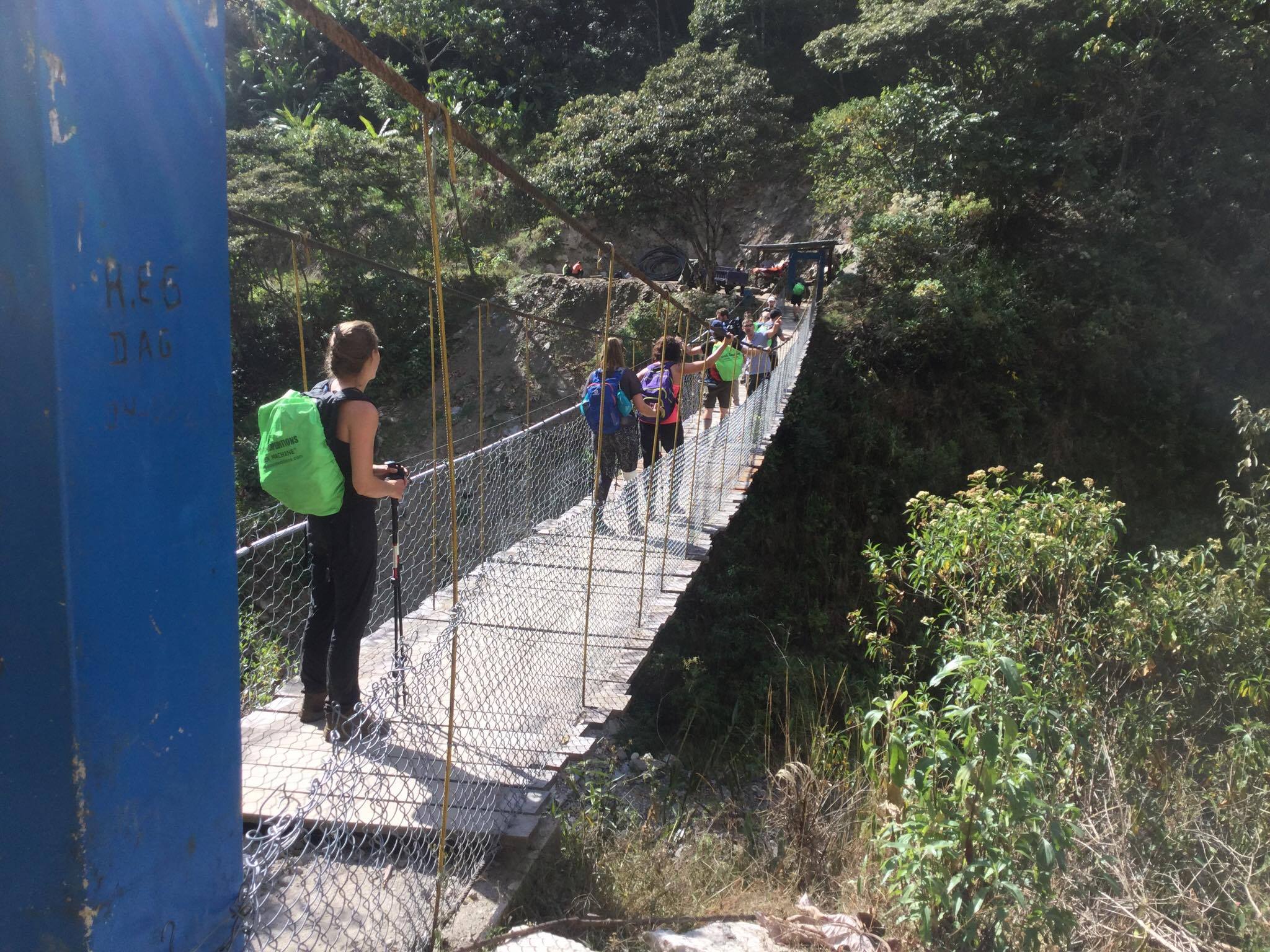 Trekkers crossing a bridge on the Inca Trail