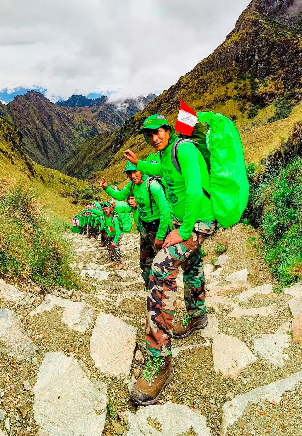 Alpaca Expeditions porters hiking in the Andes