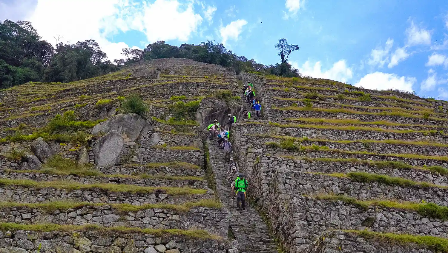 Hikers at the Intipata archaeological site on the Inca Trail