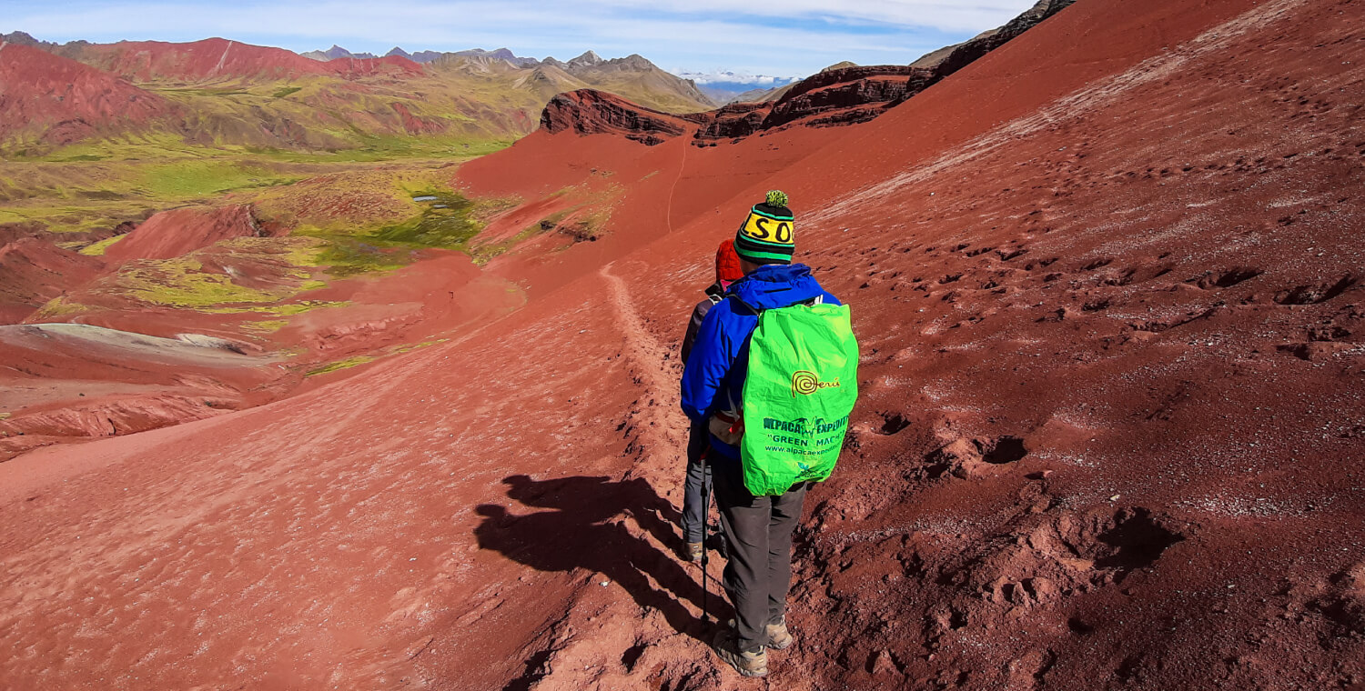 Hiking across the Red Valley on the Ausangate Trek