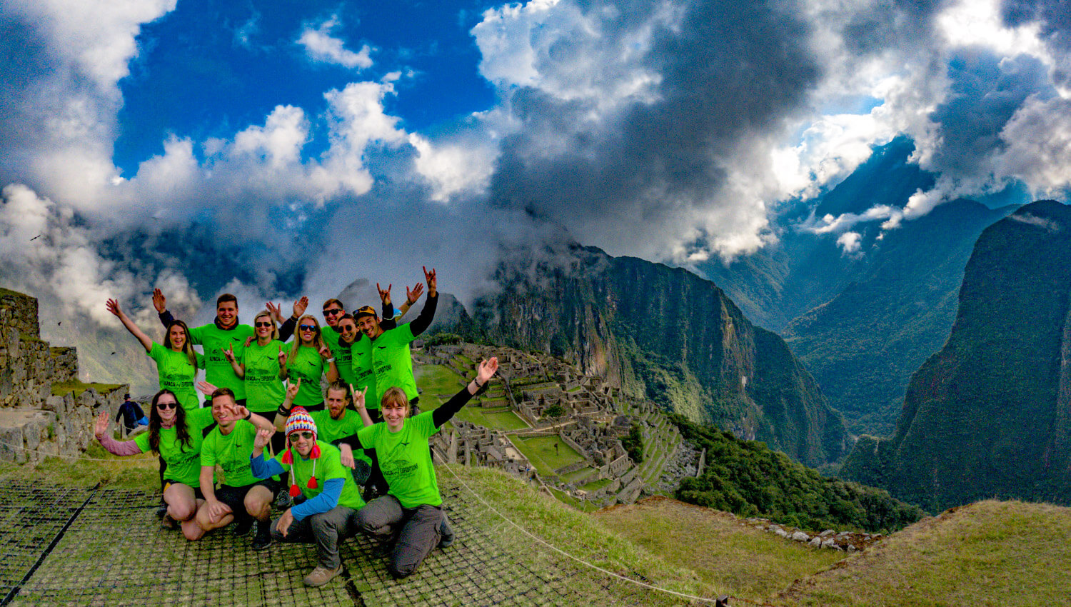 Enjoying a break with views of ruins on 2-day Inca Trail hike