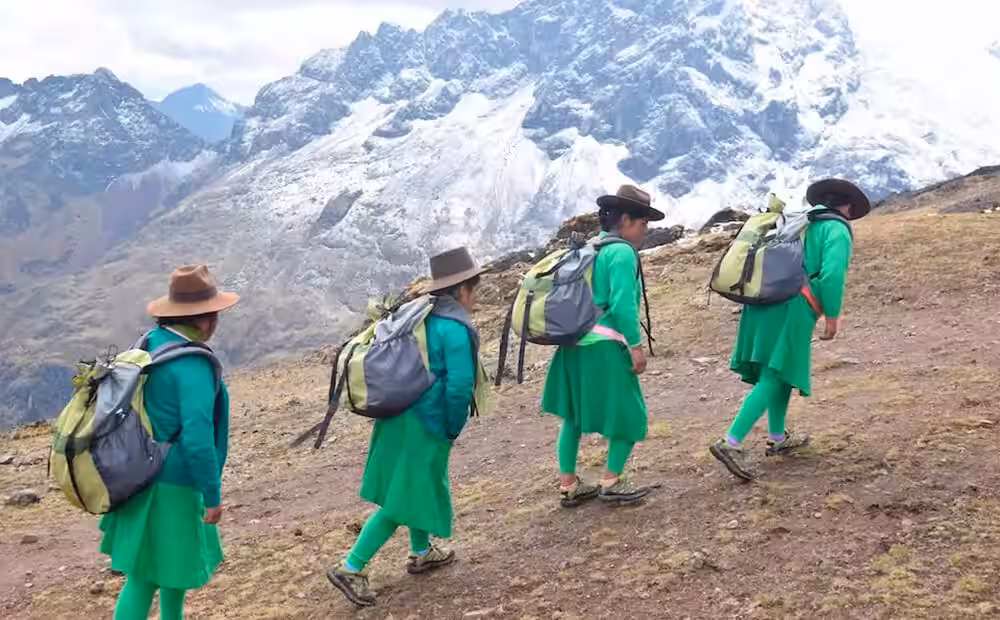 Alpaca Expeditions porters hiking in the Andes