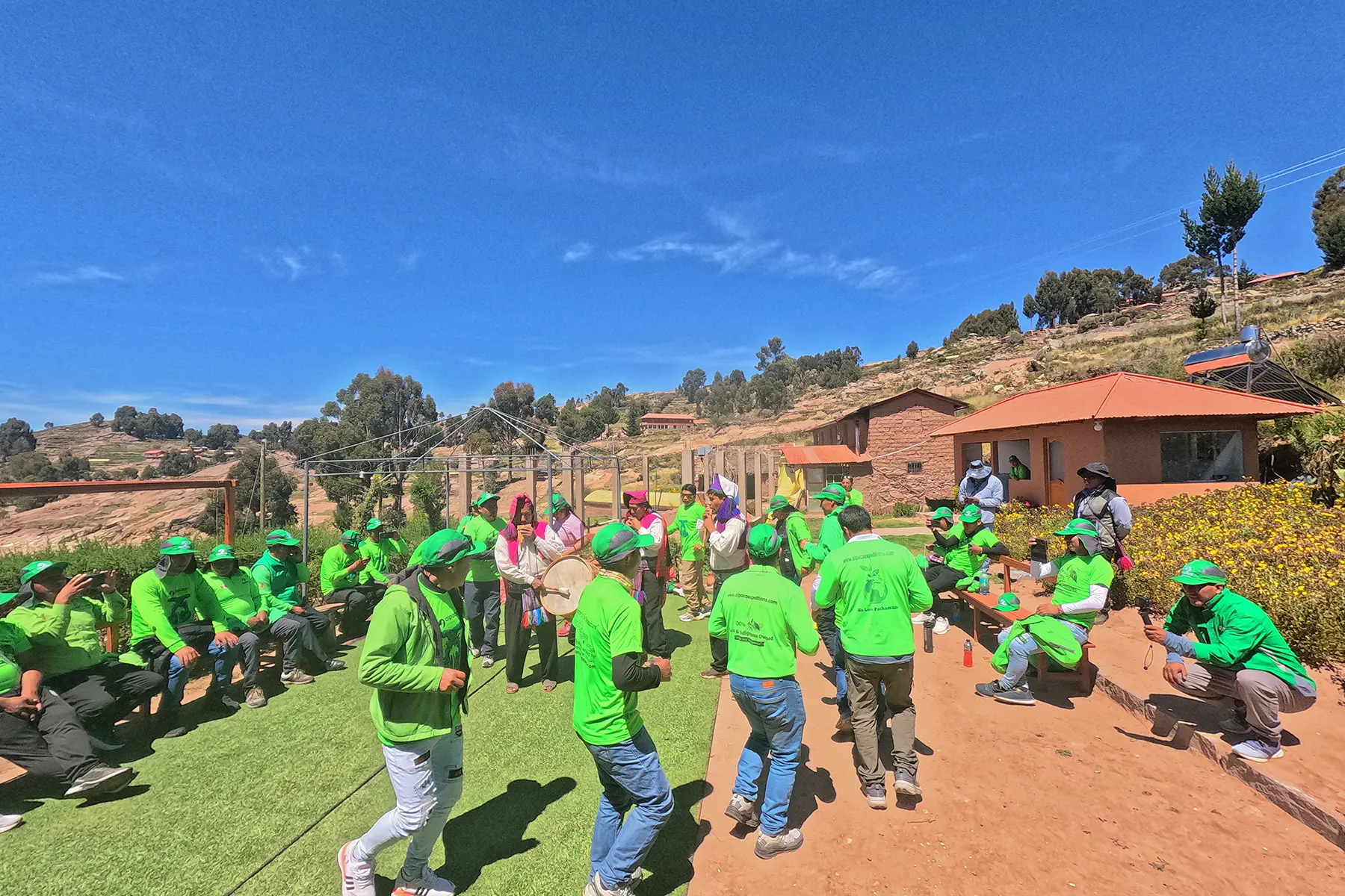 Green Machine porters visiting a rural community near Lake Titicaca during their appreciation trip.