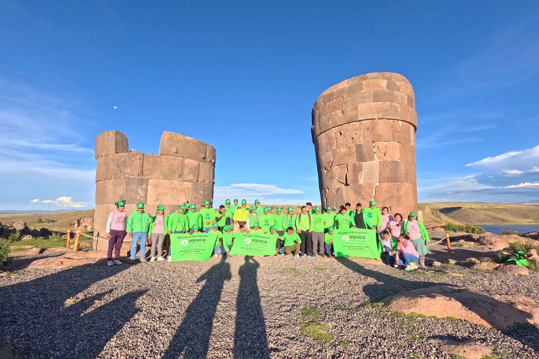 Group photo of Alpaca Expeditions porters at the Sillustani chullpas near Lake Umayo, Puno.