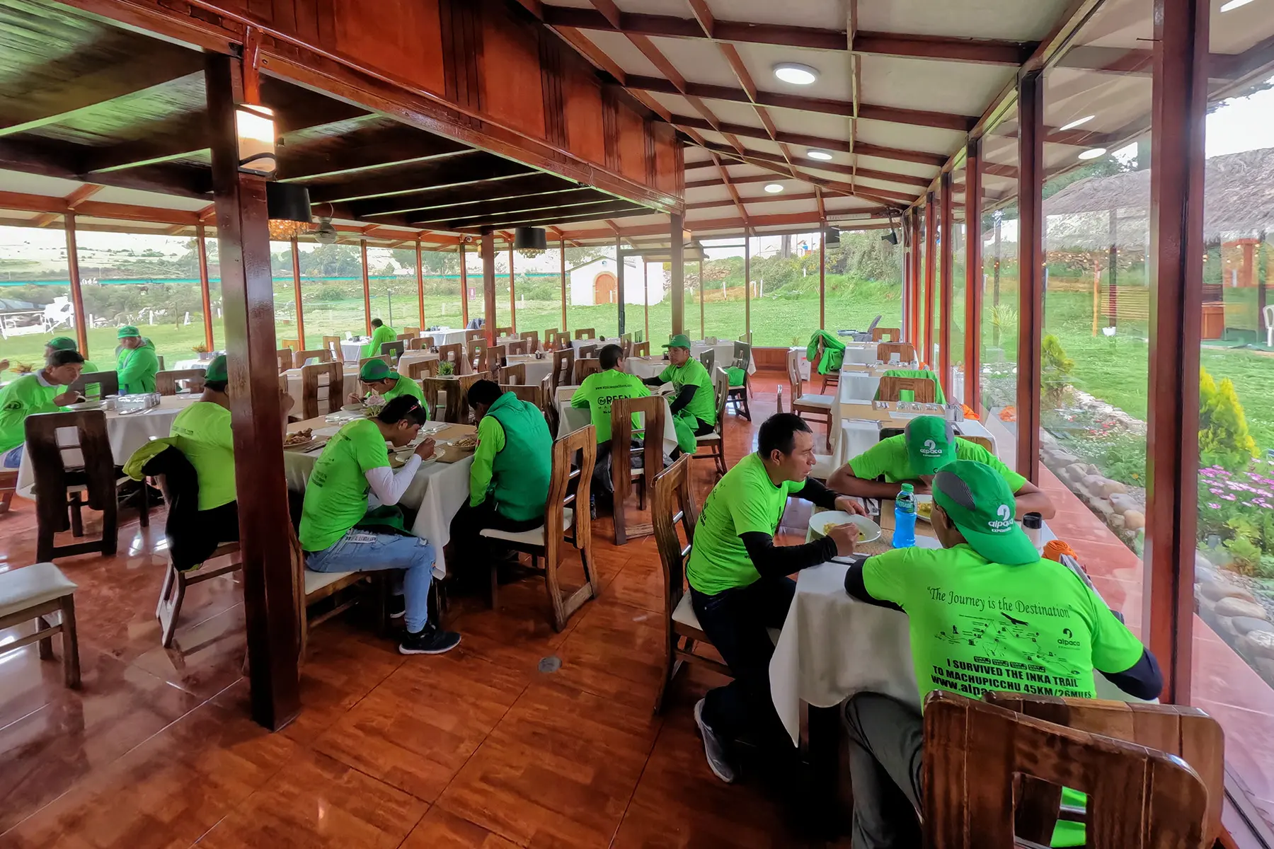 Alpaca Expeditions porters enjoying a group meal together during their vacation in Puno.