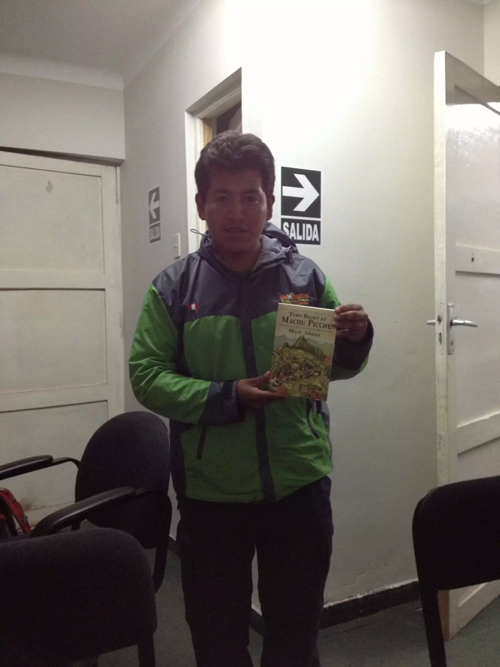 Amazing Alpaca guide Efrain receiving a copy of Turn Right at Machu Picchu